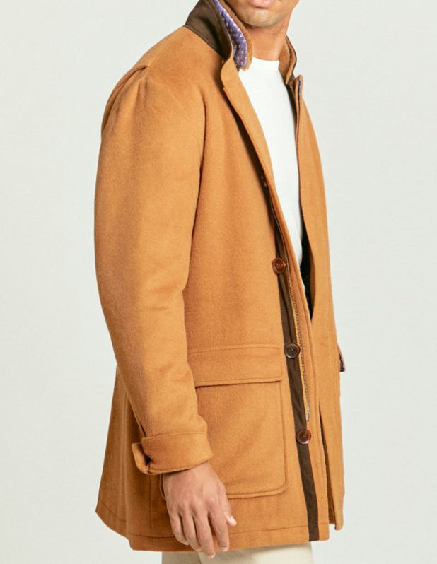 Tailored cream chinos partnered with a stylish light brown coat, styled and custom made by Senszio