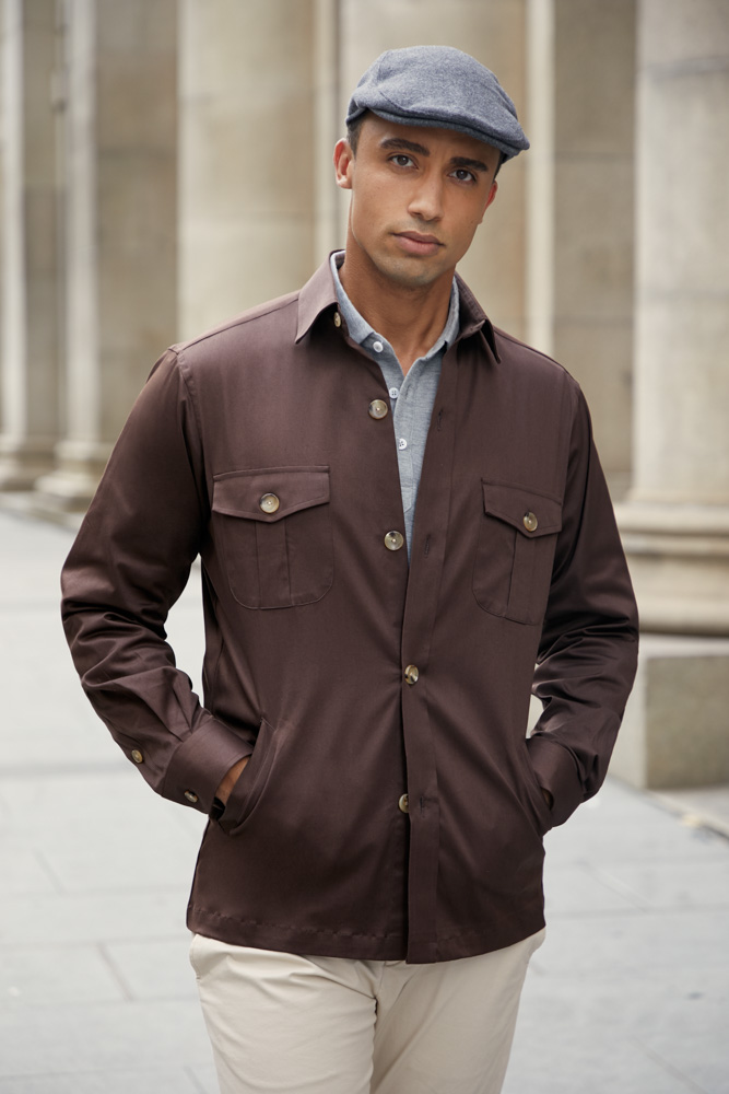 Stylish light grey polo shirt worn under a brown overshirt, custom made by Senszio
